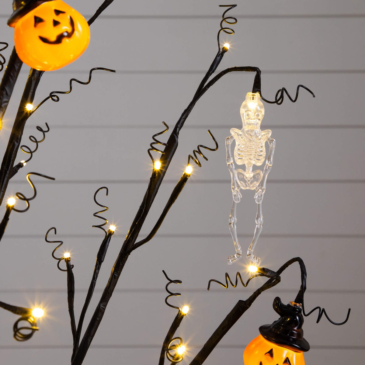 4' Pre-Lit Artificial Halloween Pumpkins and Skulls Ornament Tree with 64 Warm White LED Lights