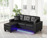 Sorenza Black 74"W PVC Reversible Sectional Sofa with Chaise