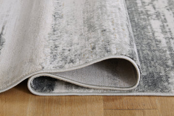 Abanett Cream/Gray Area Rug - Ornate Home