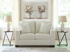 Amesley Ivory Loveseat - Ornate Home