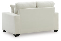 Amesley Ivory Loveseat - Ornate Home