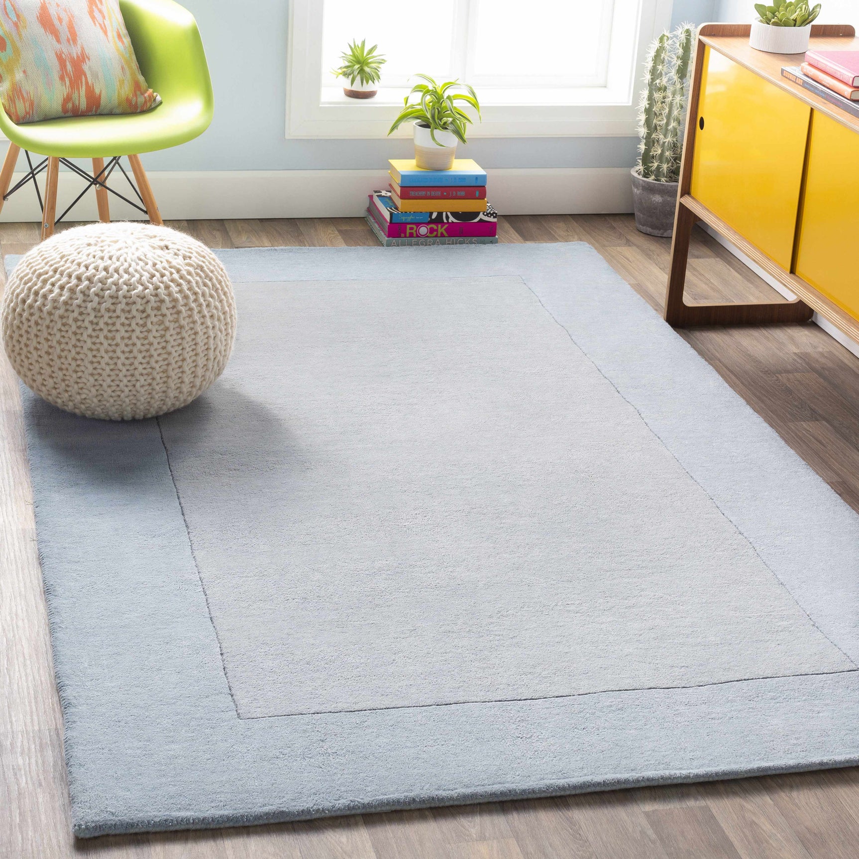 Arkabutla Solid Blue Bordered Wool Rug - Ornate Home