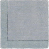 Arkabutla Solid Blue Bordered Wool Rug - Ornate Home