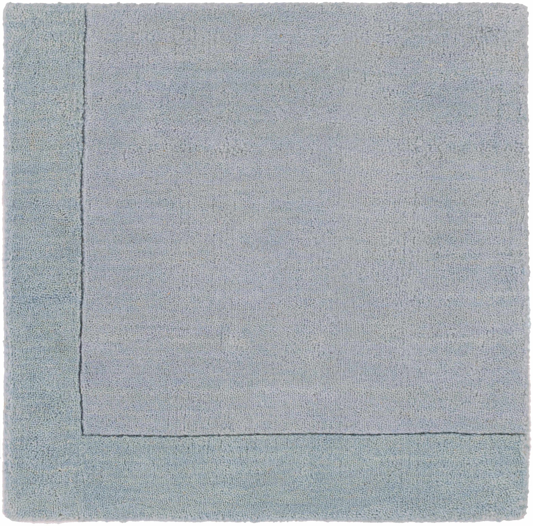 Arkabutla Solid Blue Bordered Wool Rug - Ornate Home