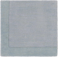 Arkabutla Solid Blue Bordered Wool Rug - Ornate Home