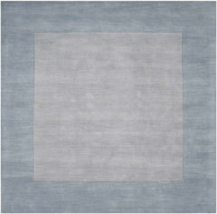 Arkabutla Solid Blue Bordered Wool Rug - Ornate Home