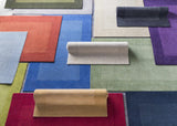 Arkabutla Solid Blue Bordered Wool Rug - Ornate Home