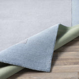 Arkabutla Solid Blue Bordered Wool Rug - Ornate Home