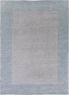 Arkabutla Solid Blue Bordered Wool Rug - Ornate Home