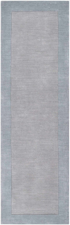 Arkabutla Solid Blue Bordered Wool Rug - Ornate Home