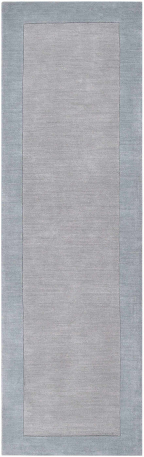 Arkabutla Solid Blue Bordered Wool Rug - Ornate Home