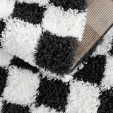 Atira Black & White Checkered Area Rug - Ornate Home