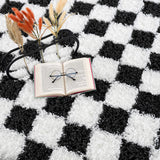 Atira Black & White Checkered Area Rug - Ornate Home