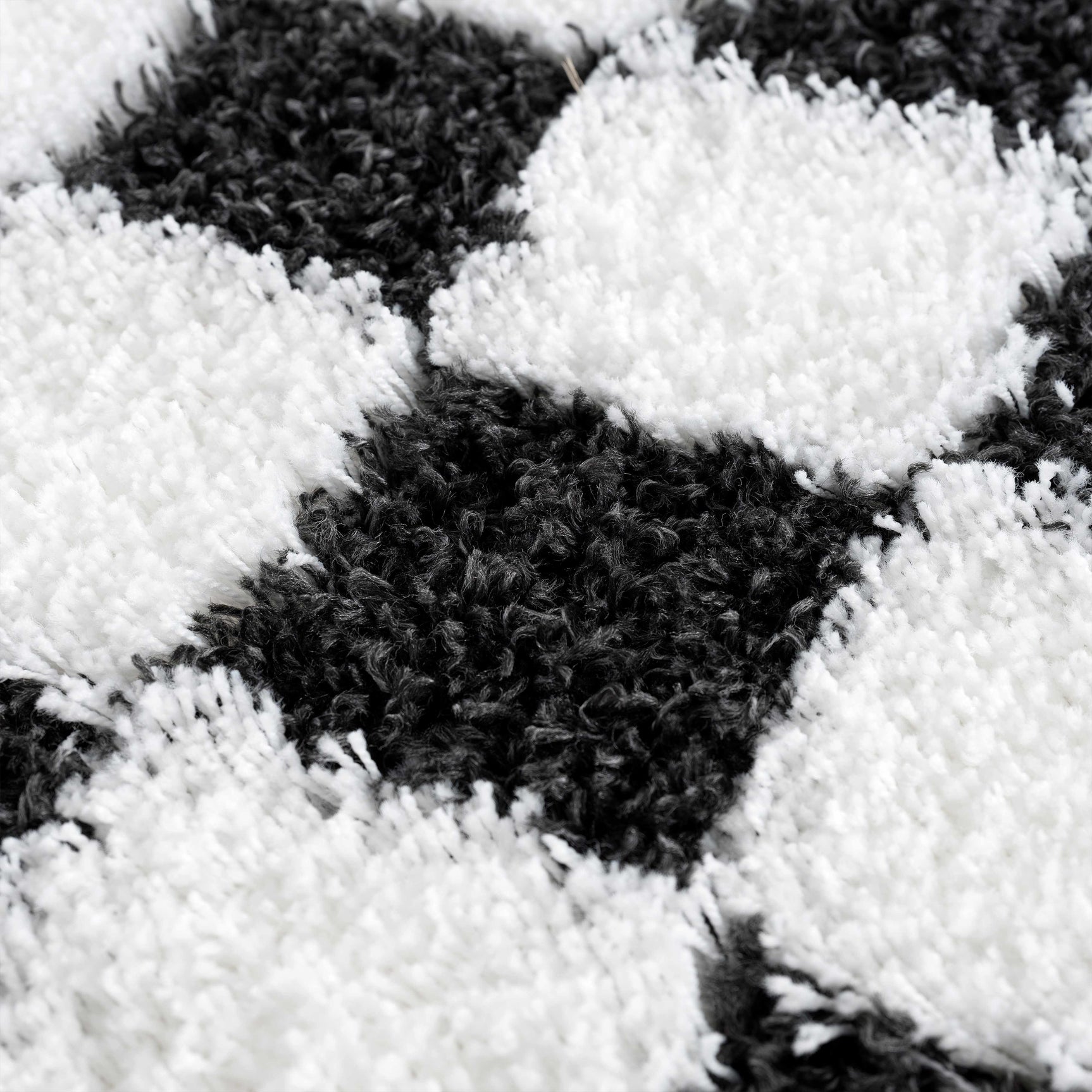 Atira Black & White Checkered Area Rug - Ornate Home