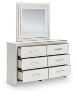 Zuraleus White King Upholstered Panel Bed, Dresser, Mirror and Nightstand (Online Special Price)
