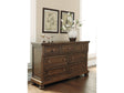 Flynnter Medium Brown Dresser - Ornate Home