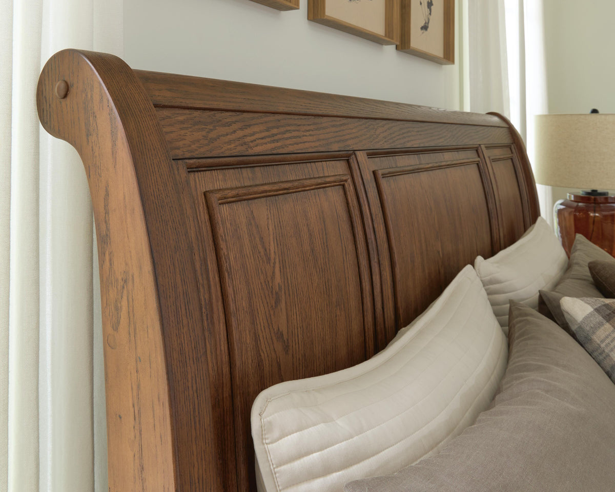Zackaryn Warm Brown California King Sleigh Storage Bed