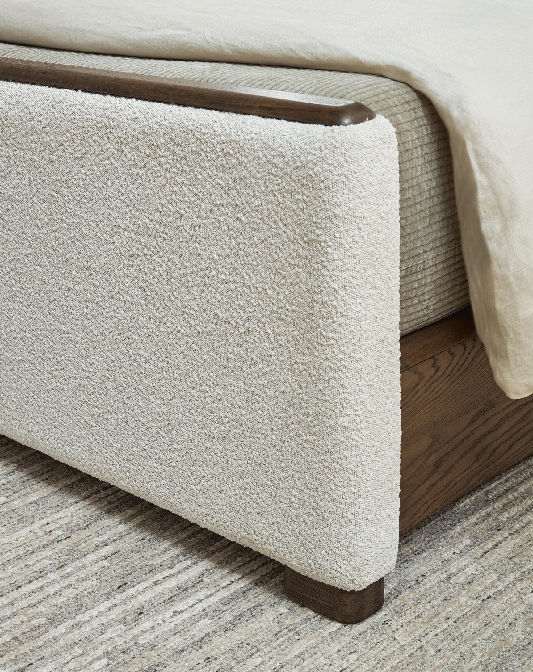 Radkin Burnished Brown King Upholstered Panel Bed