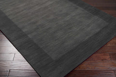 Bordered Solid Black Charcoal Wool Rug - Ornate Home
