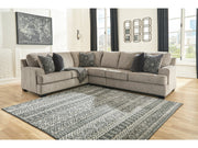 Bovarian Stone 3-Piece Sectional and Ottoman - Ornate Home