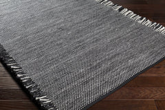 Boyden Black Area Rug with Tassels - Clearance - Ornate Home