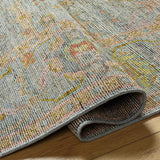 Cawny Wool Area Rug - Clearance