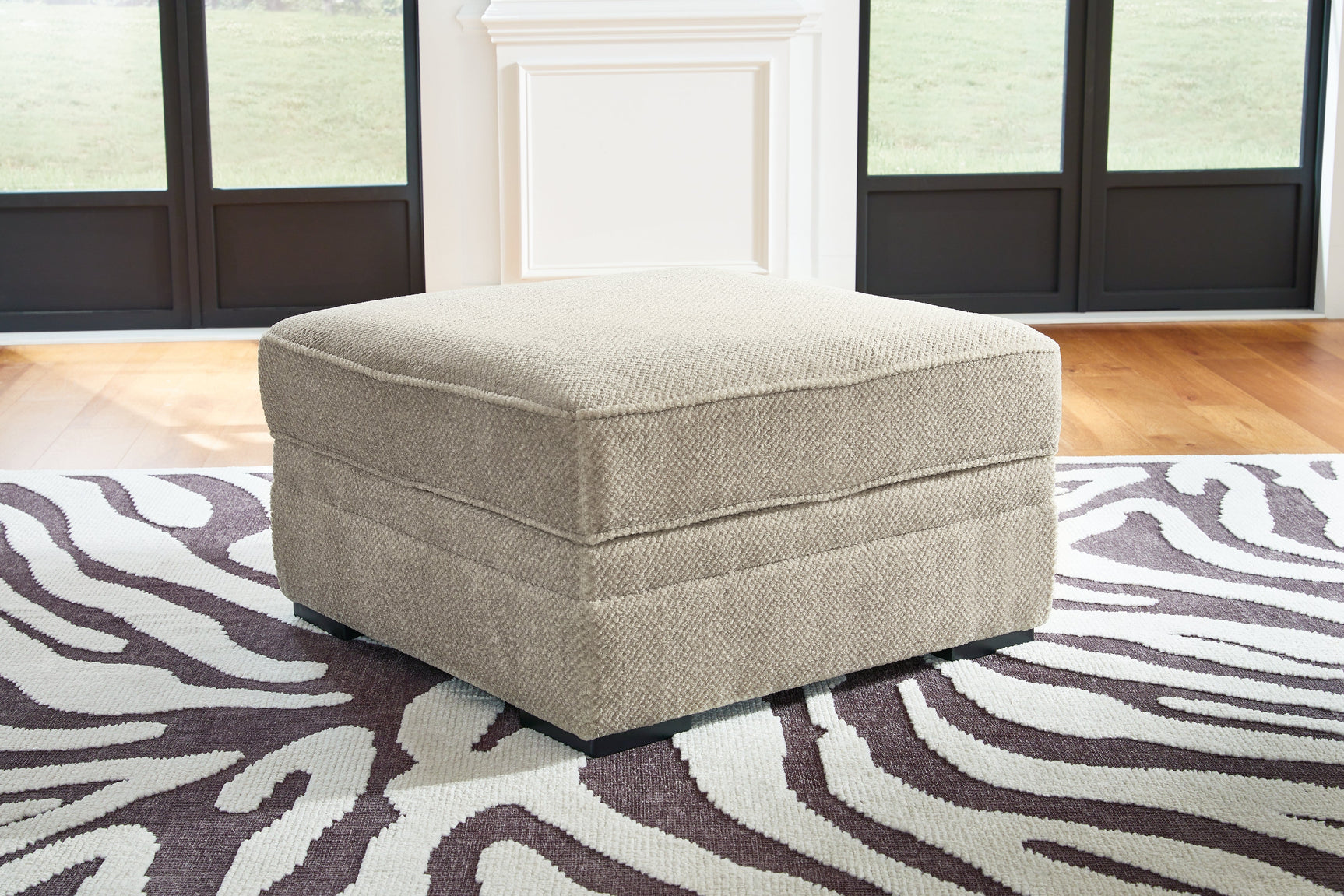 Calnita Sisal Oversized Swivel Chair and Ottoman (Online Special Price) - Ornate Home
