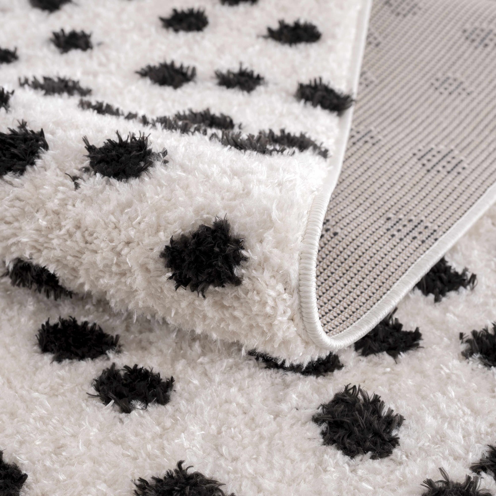 Cansu Black & White Dotted Area Rug - Ornate Home