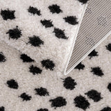 Cansu Black & White Dotted Area Rug - Ornate Home
