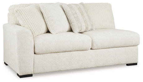 Chessington Ivory 4-Piece Sectional and Oversized Accent Ottoman - Ornate Home