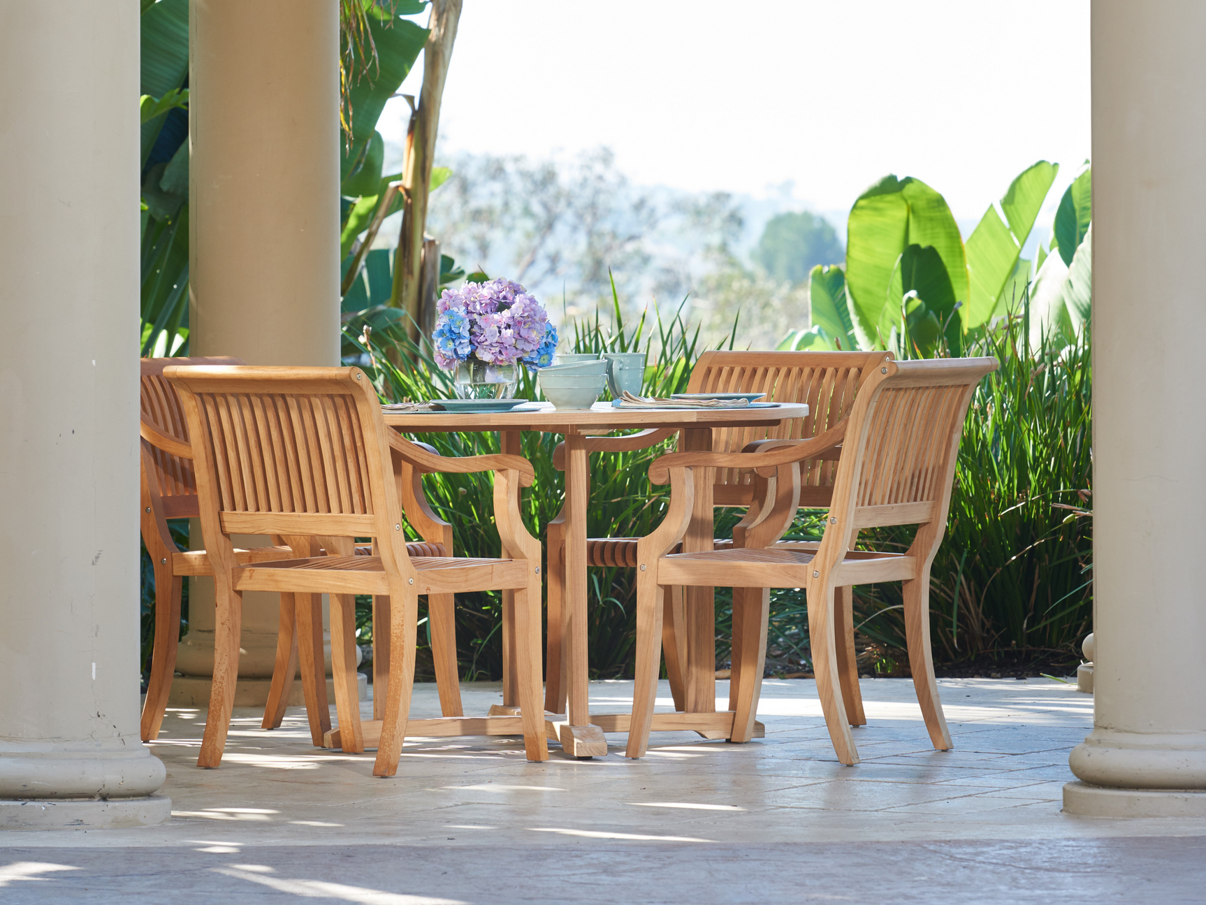 Curtis 47.25-inch Round Teak Outdoor Dining Table with Umbrella Hole - Ornate Home
