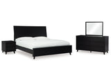 Danziar Black King Panel Bedroom Set with Dresser, Mirror and Nightstand - Ornate Home