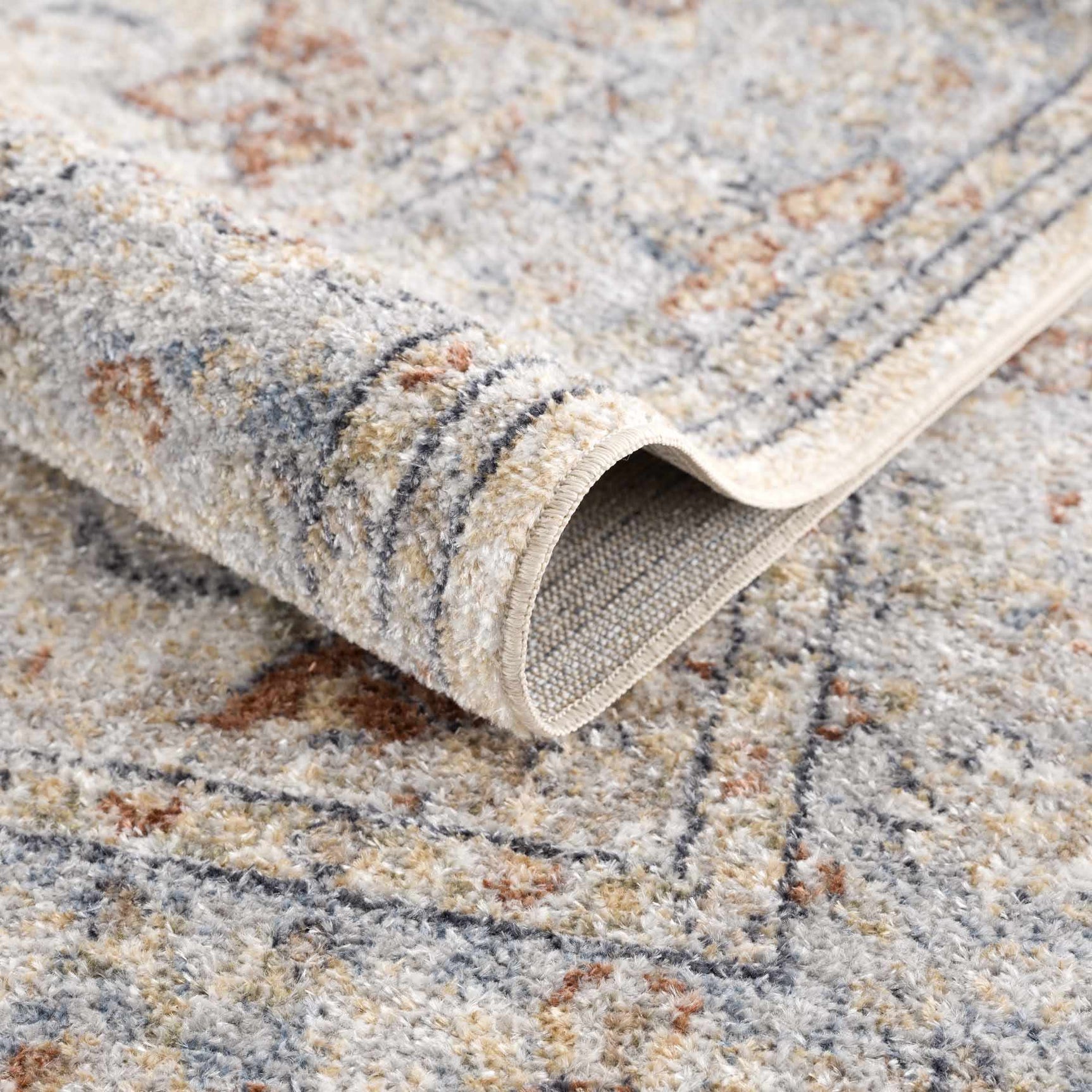 Emke Cream Washable Area Rug - Ornate Home