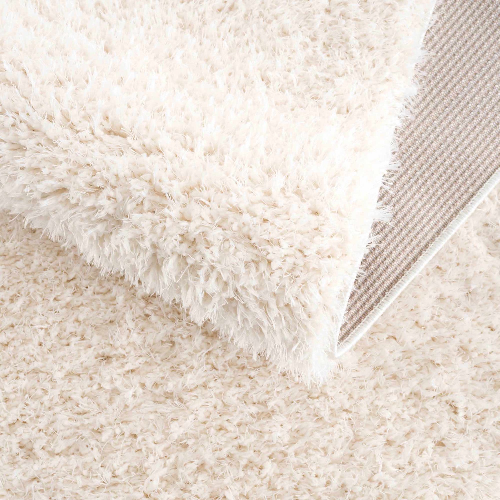 Faina Solid Cream Shag Washable Area Rug - Clearance - Ornate Home