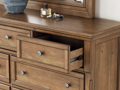 Feddinger Medium Brown Queen Panel Bed, Dresser and Mirror - Ornate Home