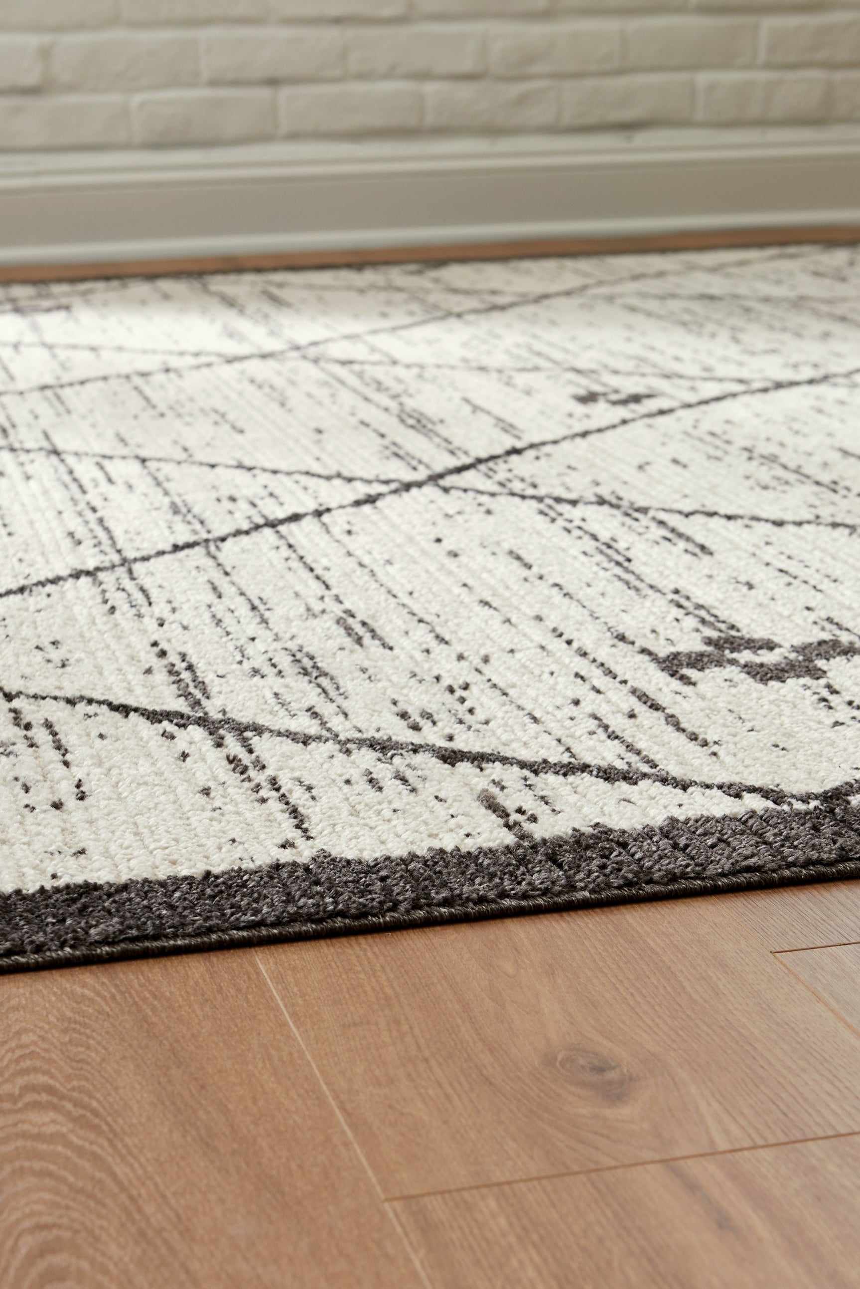 Fenriston Cream/Black Medium Rug - Ornate Home