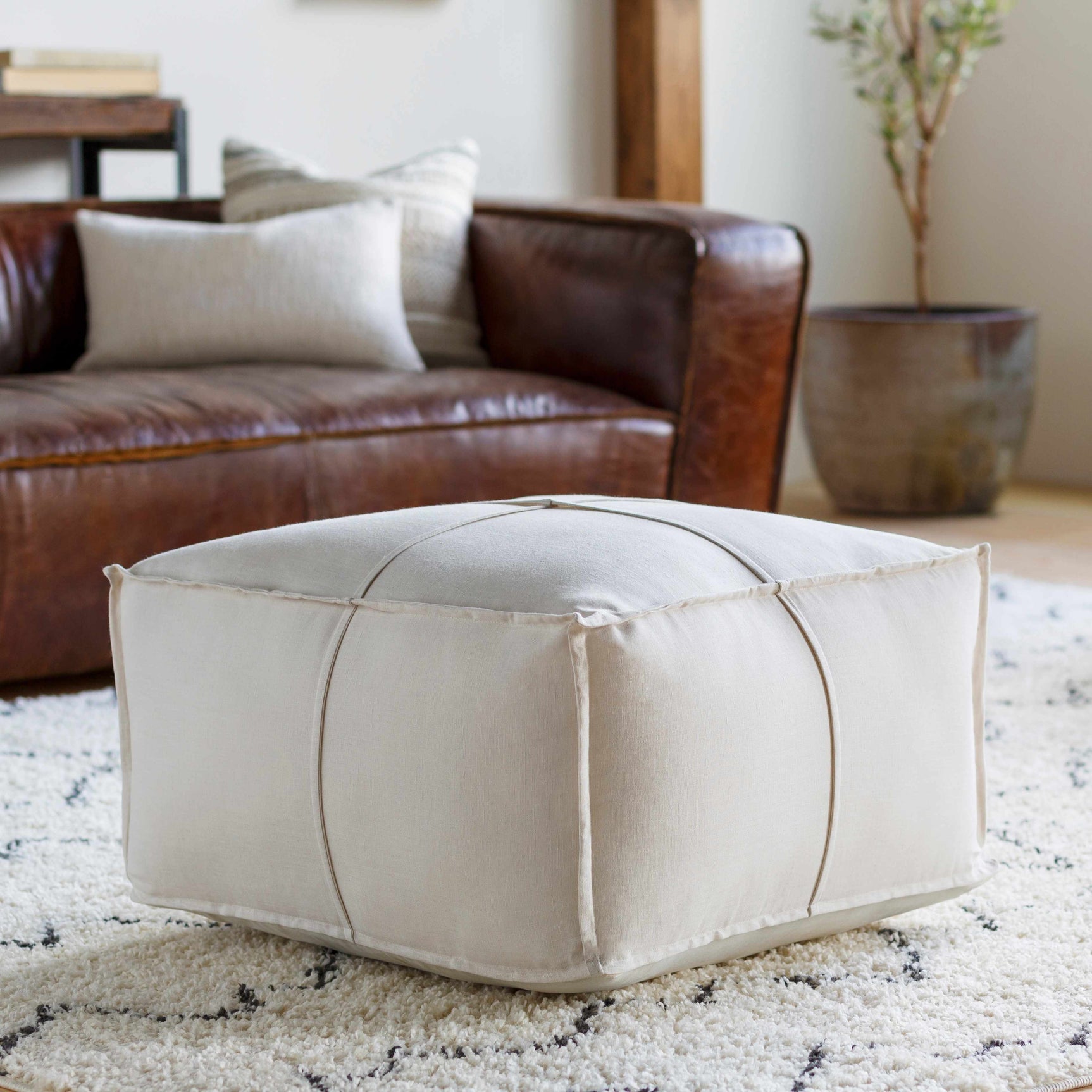 Friendsville Solid & Striped Ivory Pouf - Ornate Home