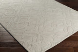 Fyffe Embossed Beige Wool Area Rug - Ornate Home
