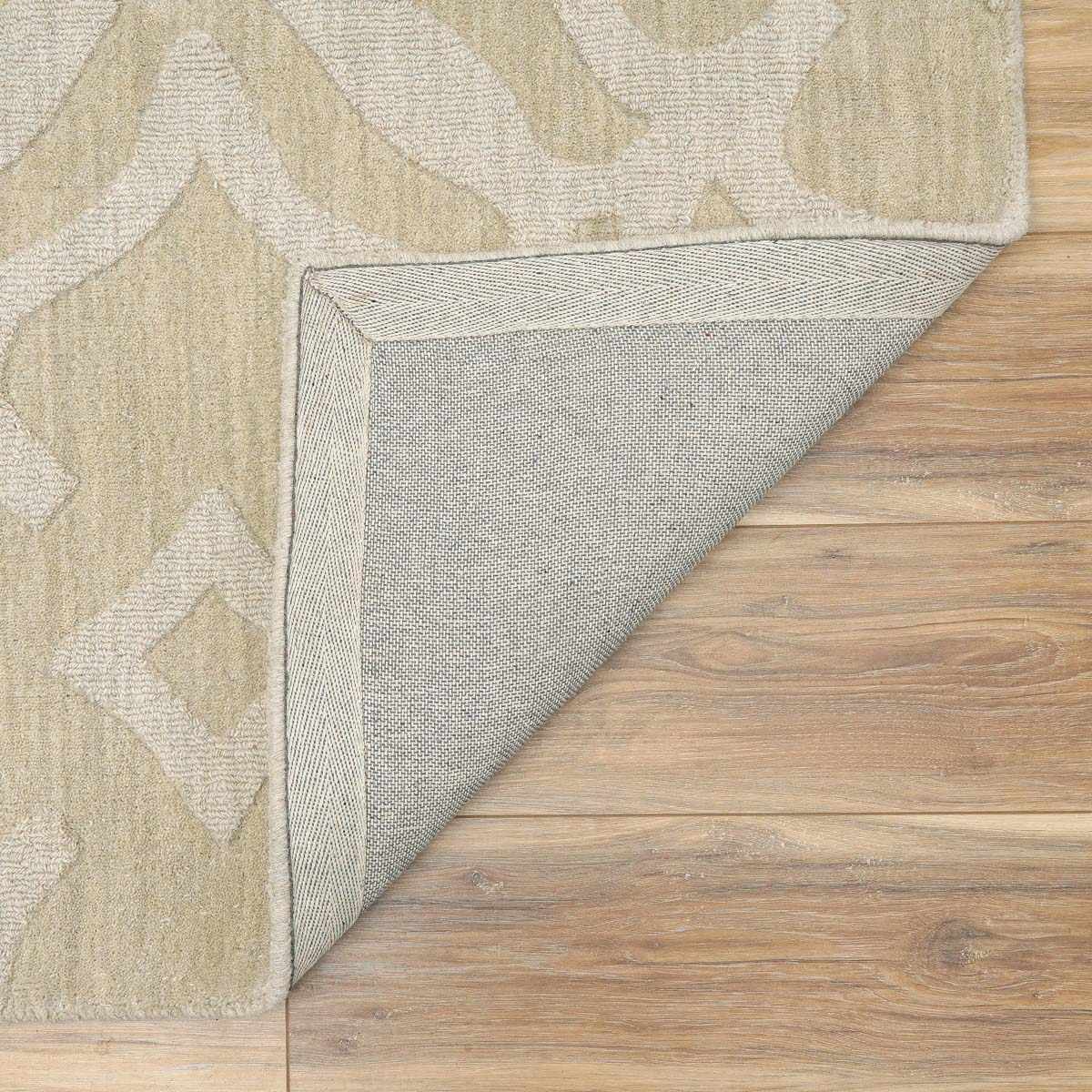 Fyffe Embossed Beige Wool Area Rug - Ornate Home