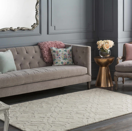 Fyffe Embossed Beige Wool Area Rug - Ornate Home