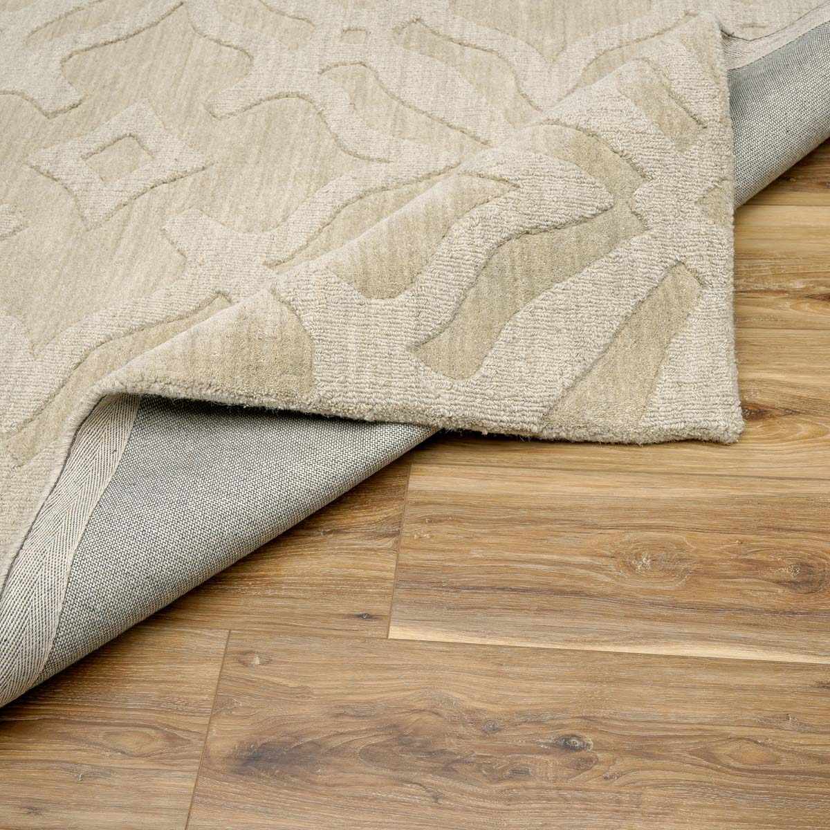 Fyffe Embossed Beige Wool Area Rug - Ornate Home