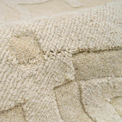 Fyffe Embossed Beige Wool Area Rug - Ornate Home