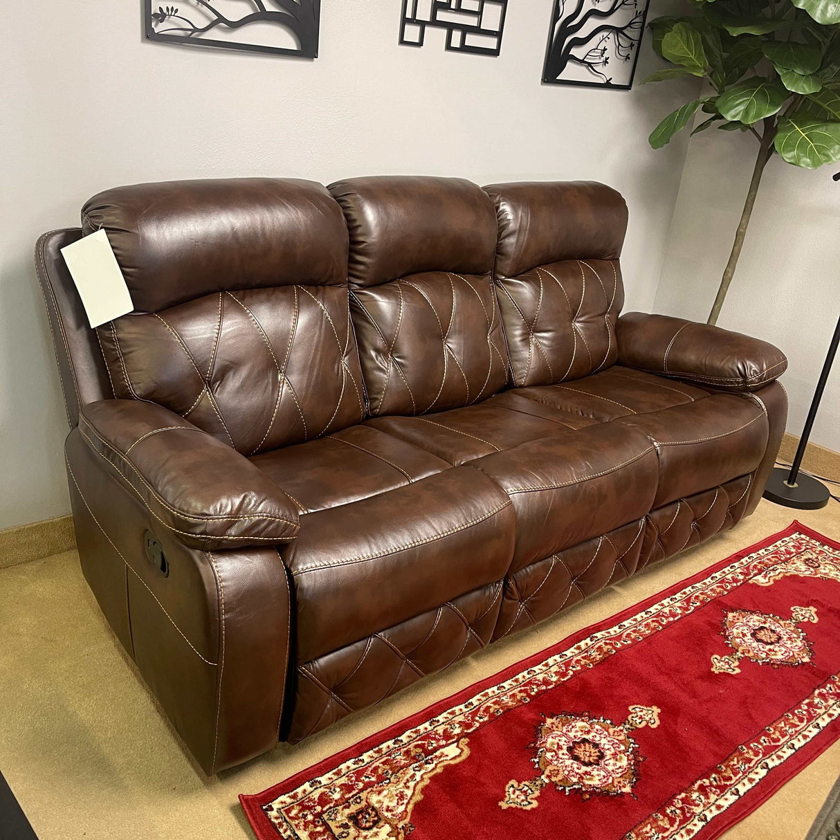 Zera Brown Airleather Manual Reclining Sofa - Ornate Home