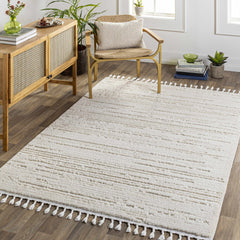 Ibarra Textured Ivory High/Low Pile Rug with Tassels - Ornate Home