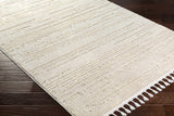 Ibarra Textured Ivory High/Low Pile Rug with Tassels - Ornate Home