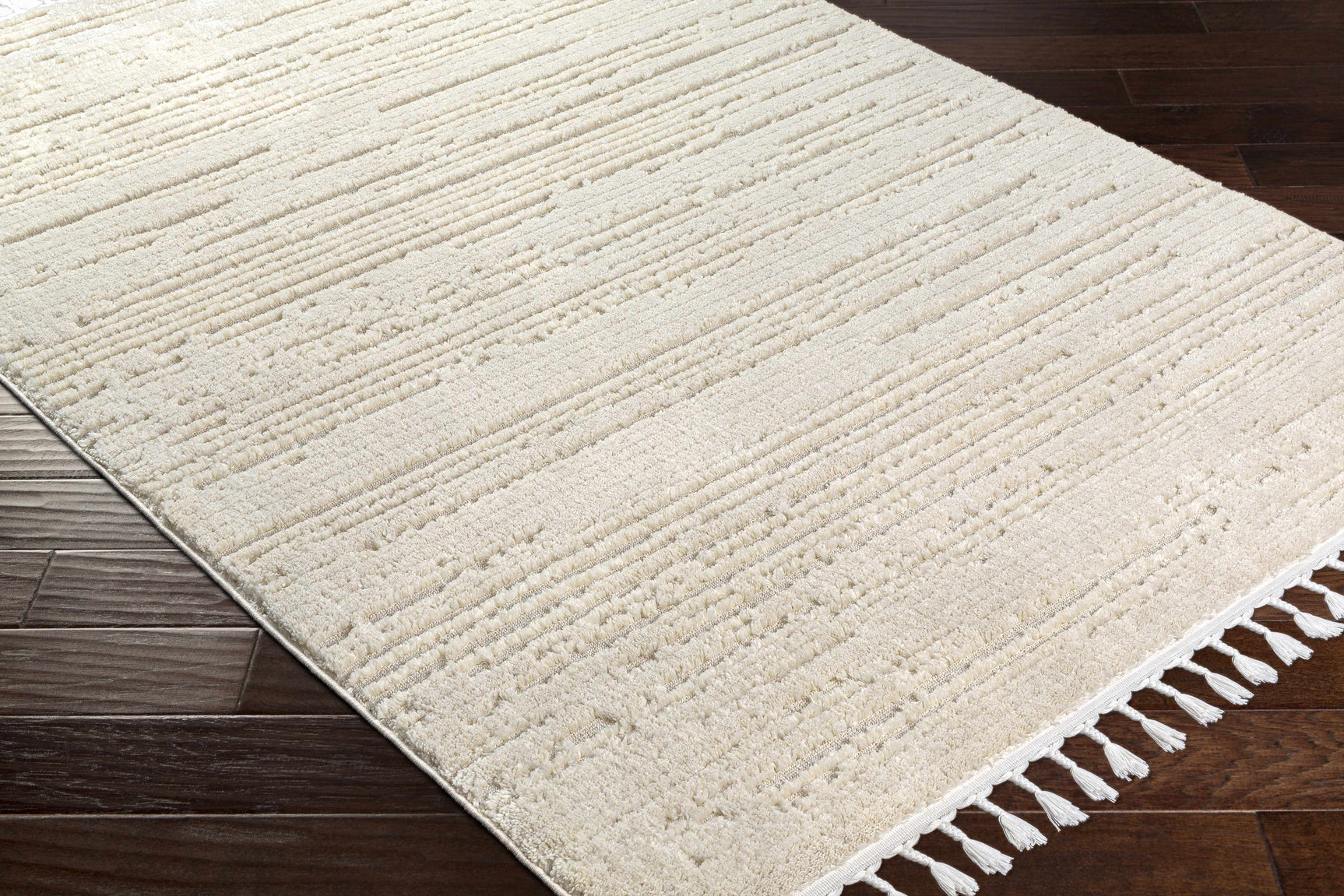 Ibarra Textured Ivory High/Low Pile Rug with Tassels - Ornate Home