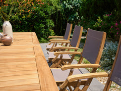 Ihland Rectangular Teak Outdoor Dining Table with Double Extensions and Umbrella Hole - Ornate Home