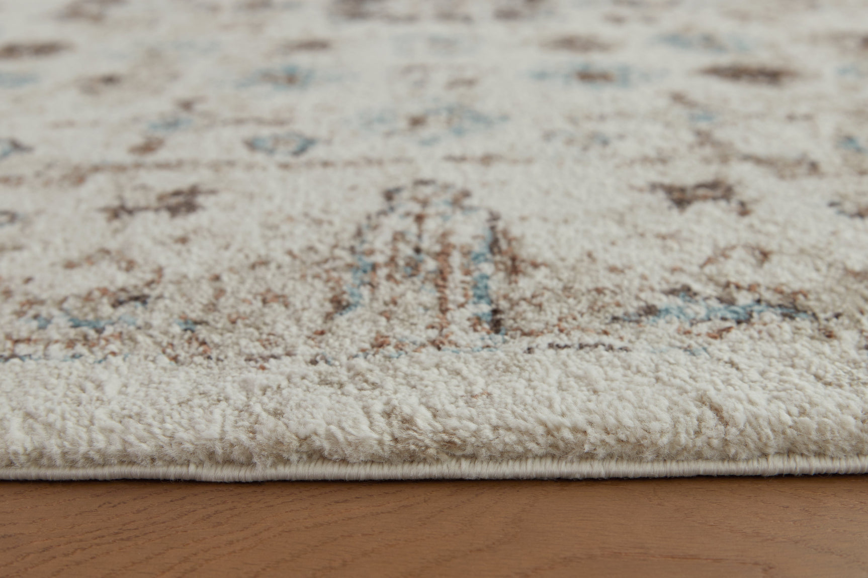 Jossler Ivory/Brown/Teal 5' x 7' Rug (Online Special Price) - Ornate Home