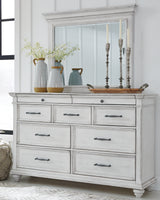 Kanwyn Whitewash King Panel Bedroom Set with Dresser, Mirror, Chest and 2 Nightstands - Ornate Home