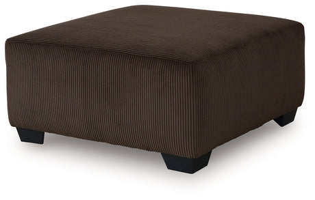 Kimlee Chocolate 3-Piece Sectional and Ottoman - Ornate Home